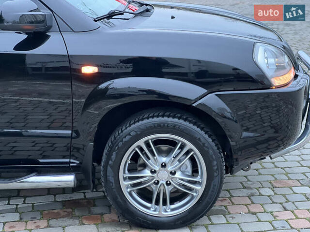Чорний Хендай Туксон, об'ємом двигуна 1.98 л та пробігом 170 тис. км за 6999 $, фото 19 на Automoto.ua