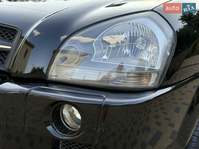 Чорний Хендай Туксон, об'ємом двигуна 1.98 л та пробігом 212 тис. км за 8200 $, фото 46 на Automoto.ua