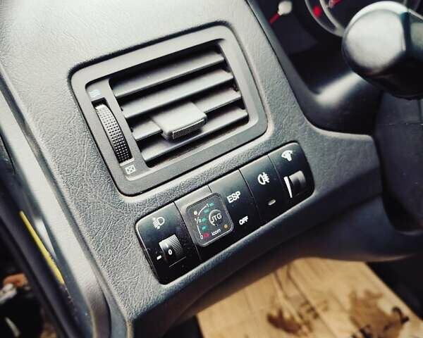 Чорний Хендай Туксон, об'ємом двигуна 2 л та пробігом 271 тис. км за 6599 $, фото 9 на Automoto.ua