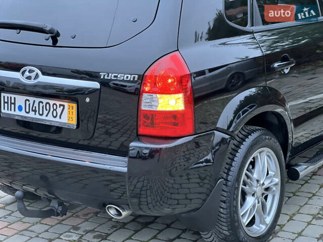Чорний Хендай Туксон, об'ємом двигуна 1.98 л та пробігом 170 тис. км за 6999 $, фото 45 на Automoto.ua