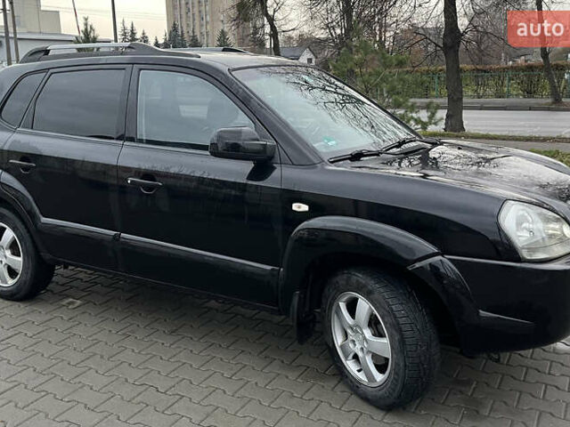 Черный Хендай Туксон, объемом двигателя 2 л и пробегом 242 тыс. км за 6999 $, фото 8 на Automoto.ua