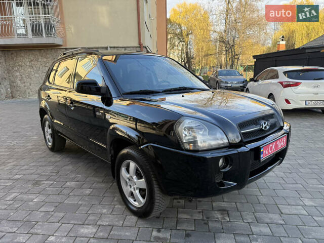 Черный Хендай Туксон, объемом двигателя 2 л и пробегом 249 тыс. км за 7450 $, фото 6 на Automoto.ua