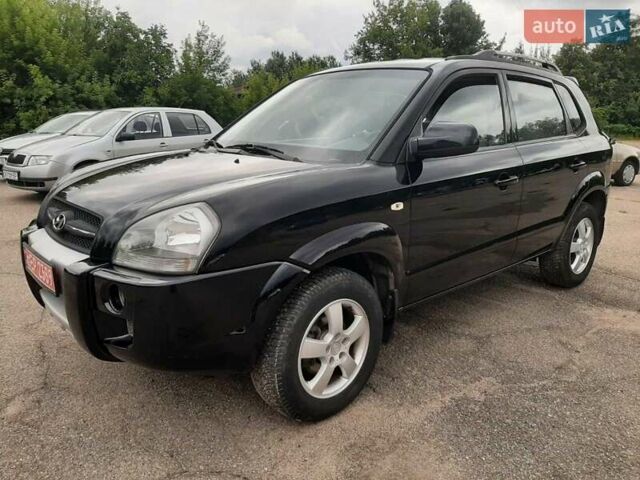 Черный Хендай Туксон, объемом двигателя 2 л и пробегом 216 тыс. км за 7600 $, фото 2 на Automoto.ua
