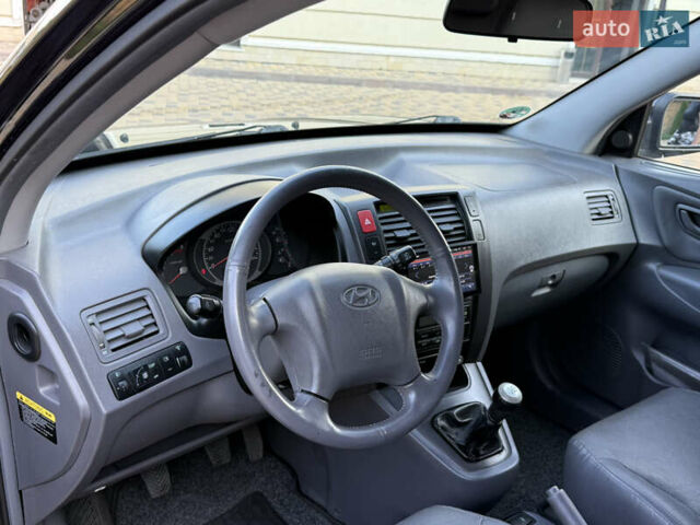 Чорний Хендай Туксон, об'ємом двигуна 1.98 л та пробігом 212 тис. км за 8200 $, фото 56 на Automoto.ua