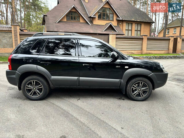 Черный Хендай Туксон, объемом двигателя 1.99 л и пробегом 266 тыс. км за 7500 $, фото 35 на Automoto.ua