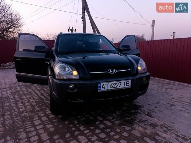 Черный Хендай Туксон, объемом двигателя 2 л и пробегом 280 тыс. км за 9500 $, фото 1 на Automoto.ua
