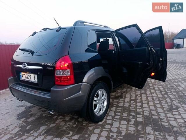 Черный Хендай Туксон, объемом двигателя 2 л и пробегом 280 тыс. км за 9500 $, фото 23 на Automoto.ua