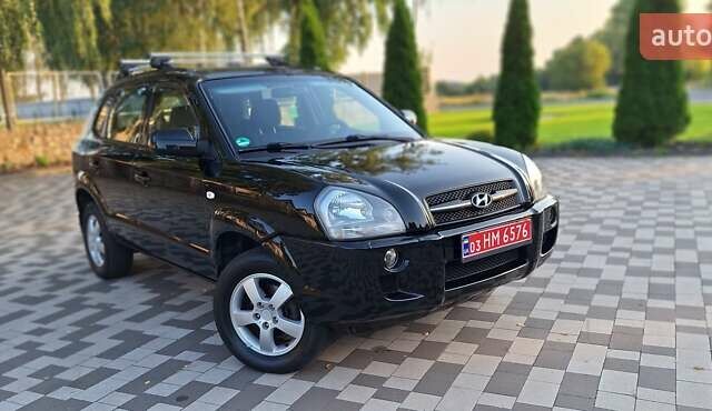 Черный Хендай Туксон, объемом двигателя 2 л и пробегом 190 тыс. км за 8150 $, фото 21 на Automoto.ua
