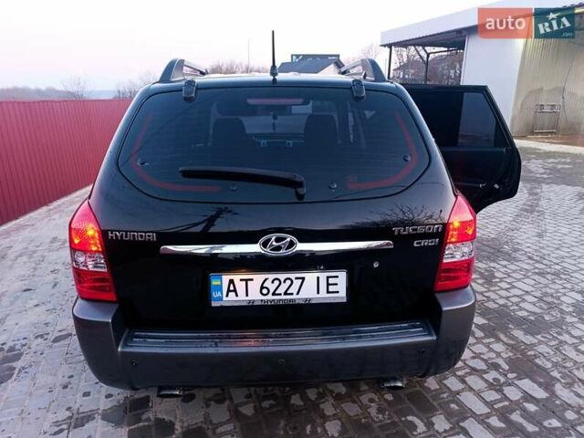 Черный Хендай Туксон, объемом двигателя 2 л и пробегом 280 тыс. км за 9500 $, фото 24 на Automoto.ua