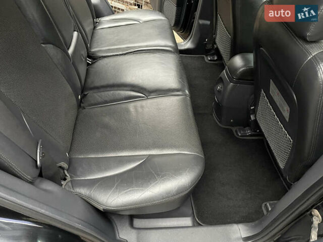 Черный Хендай Туксон, объемом двигателя 2 л и пробегом 180 тыс. км за 7700 $, фото 28 на Automoto.ua