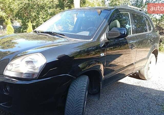 Чорний Хендай Туксон, об'ємом двигуна 1.98 л та пробігом 97 тис. км за 8600 $, фото 7 на Automoto.ua