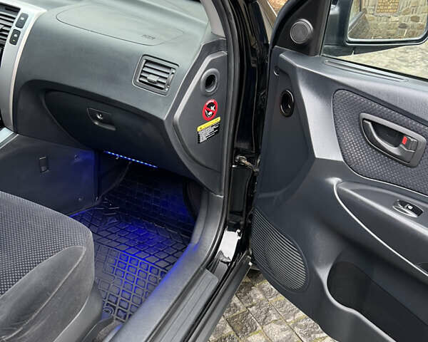 Чорний Хендай Туксон, об'ємом двигуна 1.98 л та пробігом 155 тис. км за 8750 $, фото 12 на Automoto.ua