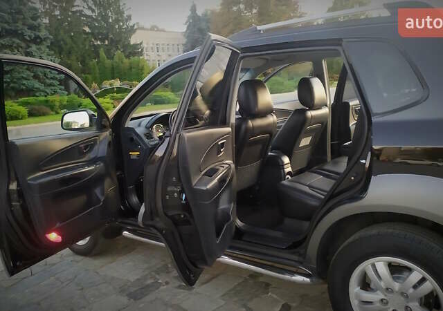 Черный Хендай Туксон, объемом двигателя 2 л и пробегом 230 тыс. км за 8600 $, фото 195 на Automoto.ua