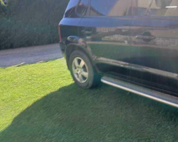 Черный Хендай Туксон, объемом двигателя 2 л и пробегом 15 тыс. км за 6200 $, фото 7 на Automoto.ua