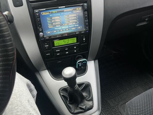 Хендай Туксон 2007 у Кам'янське (Дніпродзержинськ) на Automoto.ua Чорний Хендай Туксон, об'ємом двигуна 2 л та пробігом 162 тис. км за 7999 $, фото 14 на Automoto.ua