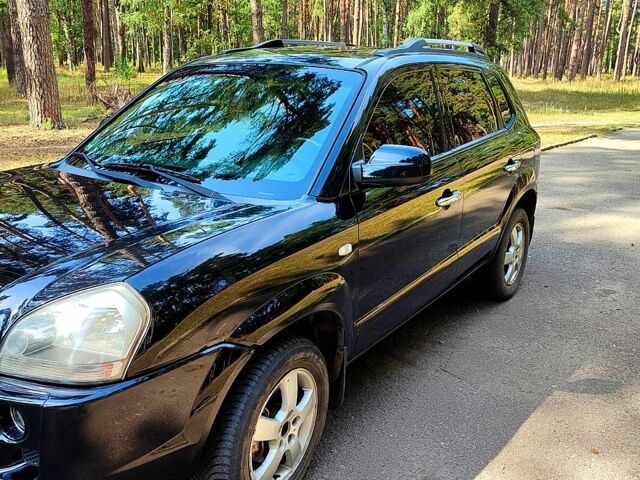 Черный Хендай Туксон, объемом двигателя 2 л и пробегом 270 тыс. км за 7800 $, фото 1 на Automoto.ua