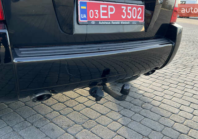 Черный Хендай Туксон, объемом двигателя 1.98 л и пробегом 243 тыс. км за 8500 $, фото 17 на Automoto.ua