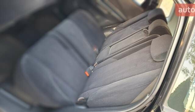 Черный Хендай Туксон, объемом двигателя 2 л и пробегом 190 тыс. км за 8150 $, фото 23 на Automoto.ua