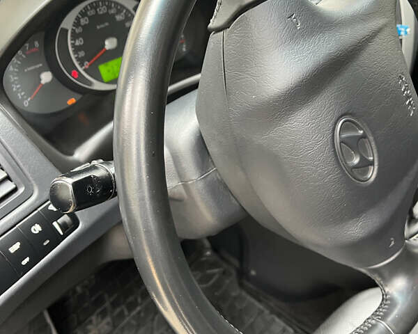 Черный Хендай Туксон, объемом двигателя 1.98 л и пробегом 99 тыс. км за 8999 $, фото 18 на Automoto.ua