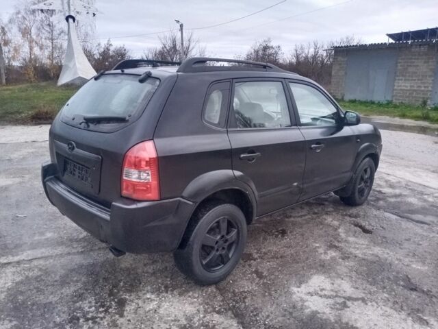 Черный Хендай Туксон, объемом двигателя 2 л и пробегом 280 тыс. км за 3500 $, фото 3 на Automoto.ua