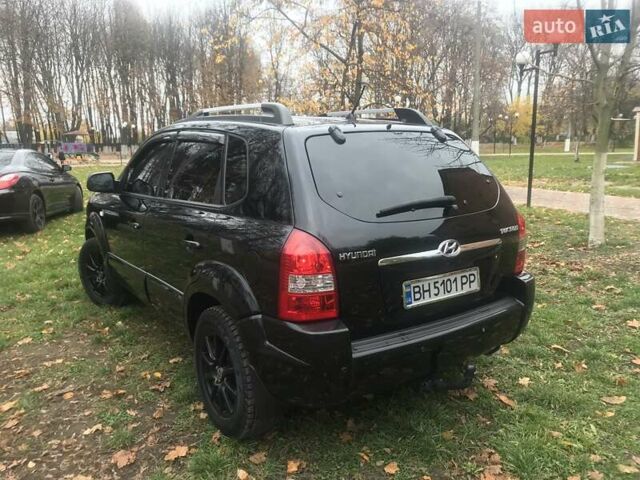 Черный Хендай Туксон, объемом двигателя 2 л и пробегом 210 тыс. км за 8999 $, фото 30 на Automoto.ua