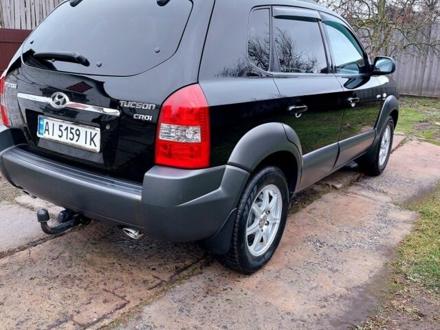 Черный Хендай Туксон, объемом двигателя 2 л и пробегом 272 тыс. км за 7500 $, фото 3 на Automoto.ua