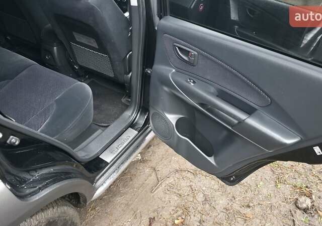 Чорний Хендай Туксон, об'ємом двигуна 2 л та пробігом 207 тис. км за 8200 $, фото 19 на Automoto.ua