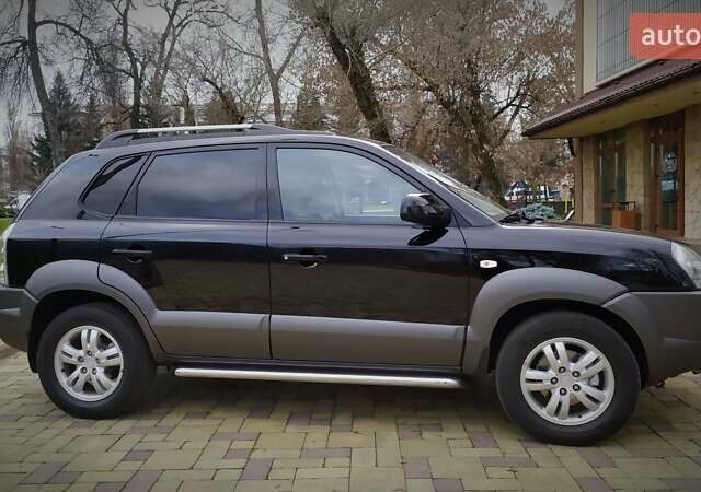 Чорний Хендай Туксон, об'ємом двигуна 2 л та пробігом 229 тис. км за 8600 $, фото 24 на Automoto.ua