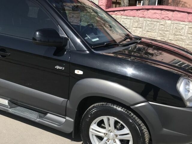 Чорний Хендай Туксон, об'ємом двигуна 2 л та пробігом 150 тис. км за 8100 $, фото 6 на Automoto.ua