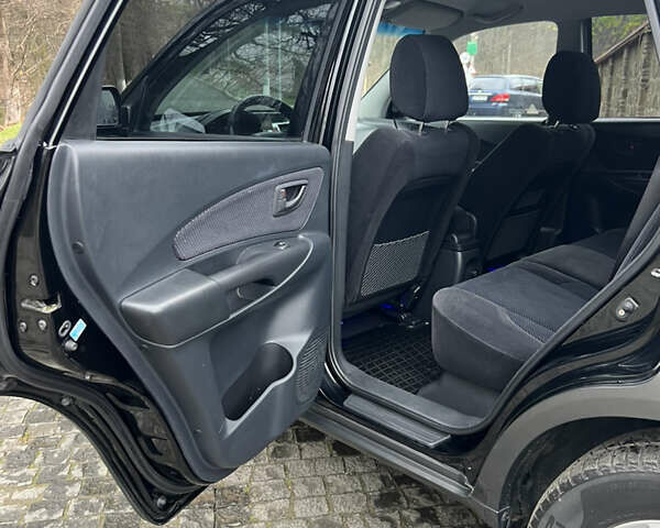 Чорний Хендай Туксон, об'ємом двигуна 1.98 л та пробігом 155 тис. км за 8750 $, фото 19 на Automoto.ua