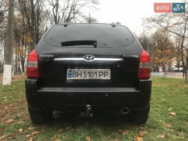 Черный Хендай Туксон, объемом двигателя 2 л и пробегом 210 тыс. км за 8999 $, фото 25 на Automoto.ua