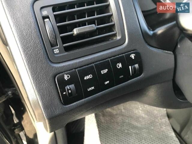 Черный Хендай Туксон, объемом двигателя 2 л и пробегом 180 тыс. км за 9200 $, фото 4 на Automoto.ua