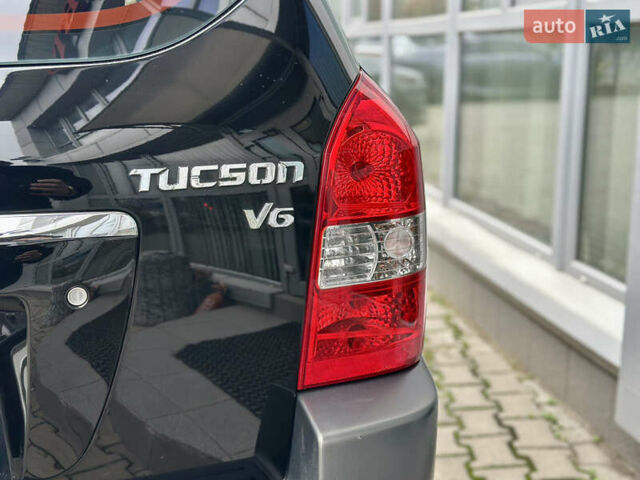 Чорний Хендай Туксон, об'ємом двигуна 2.66 л та пробігом 145 тис. км за 8900 $, фото 8 на Automoto.ua