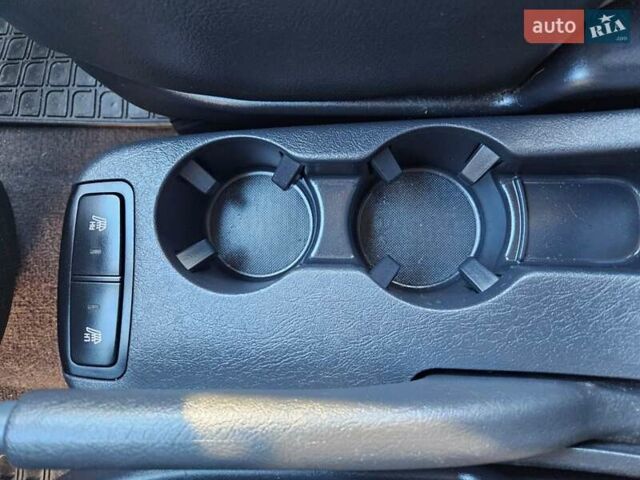 Чорний Хендай Туксон, об'ємом двигуна 2 л та пробігом 152 тис. км за 7950 $, фото 21 на Automoto.ua