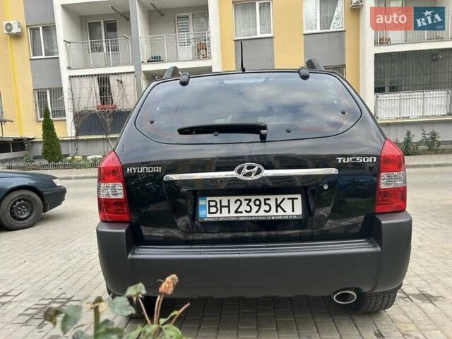 Черный Хендай Туксон, объемом двигателя 1.98 л и пробегом 147 тыс. км за 8000 $, фото 34 на Automoto.ua