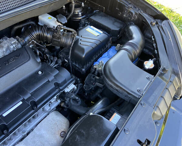 Черный Хендай Туксон, объемом двигателя 1.98 л и пробегом 197 тыс. км за 8000 $, фото 48 на Automoto.ua