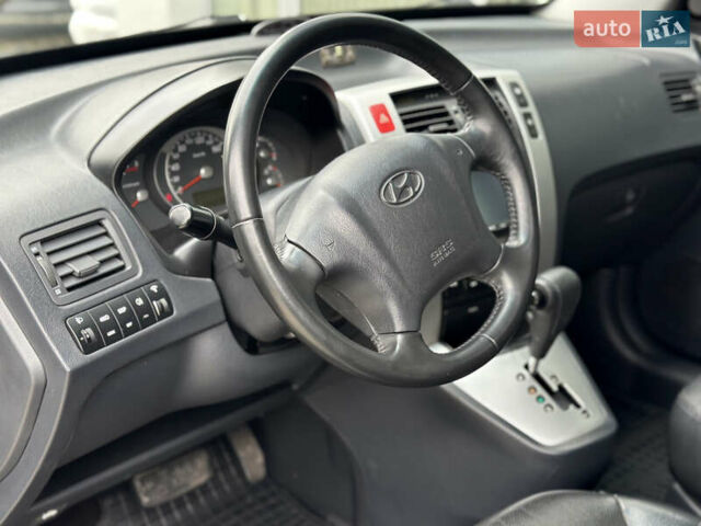 Чорний Хендай Туксон, об'ємом двигуна 2.66 л та пробігом 145 тис. км за 8900 $, фото 17 на Automoto.ua