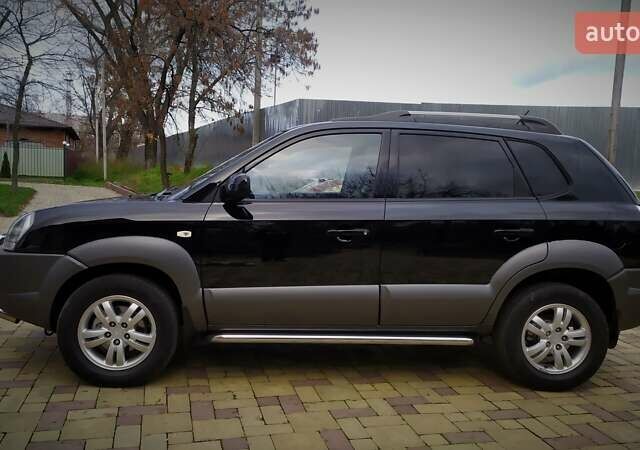 Чорний Хендай Туксон, об'ємом двигуна 2 л та пробігом 229 тис. км за 8600 $, фото 30 на Automoto.ua