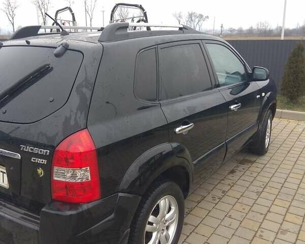 Черный Хендай Туксон, объемом двигателя 2 л и пробегом 277 тыс. км за 7900 $, фото 4 на Automoto.ua