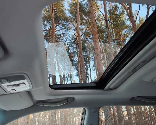 Черный Хендай Туксон, объемом двигателя 1.98 л и пробегом 335 тыс. км за 7800 $, фото 5 на Automoto.ua