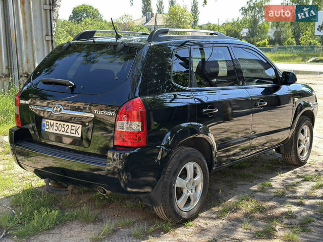 Чорний Хендай Туксон, об'ємом двигуна 2 л та пробігом 165 тис. км за 8500 $, фото 2 на Automoto.ua
