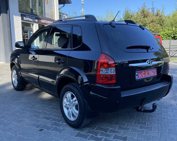 Черный Хендай Туксон, объемом двигателя 1.98 л и пробегом 197 тыс. км за 8000 $, фото 5 на Automoto.ua