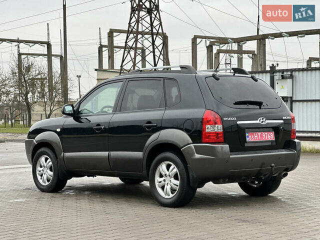 Чорний Хендай Туксон, об'ємом двигуна 2 л та пробігом 230 тис. км за 6850 $, фото 5 на Automoto.ua