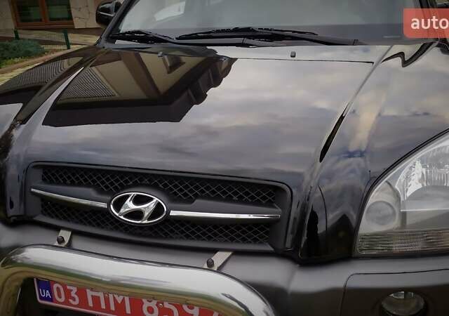 Чорний Хендай Туксон, об'ємом двигуна 2 л та пробігом 229 тис. км за 8600 $, фото 59 на Automoto.ua
