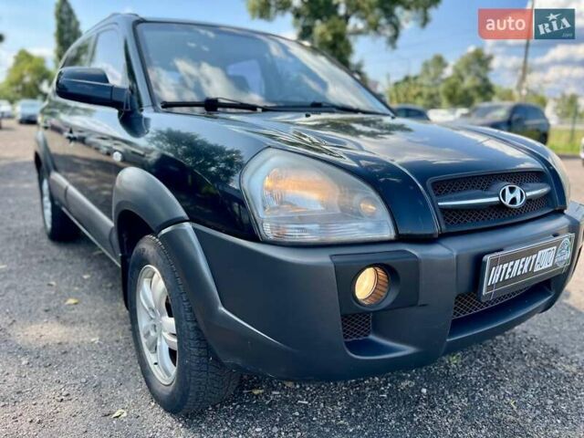 Черный Хендай Туксон, объемом двигателя 2 л и пробегом 227 тыс. км за 8200 $, фото 32 на Automoto.ua