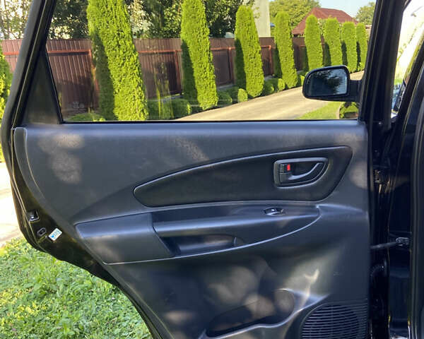 Черный Хендай Туксон, объемом двигателя 1.98 л и пробегом 197 тыс. км за 8000 $, фото 33 на Automoto.ua