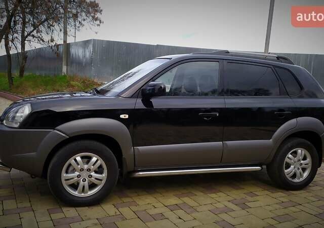 Чорний Хендай Туксон, об'ємом двигуна 2 л та пробігом 229 тис. км за 8600 $, фото 28 на Automoto.ua