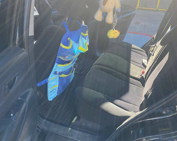 Чорний Хендай Туксон, об'ємом двигуна 1.98 л та пробігом 215 тис. км за 7540 $, фото 9 на Automoto.ua