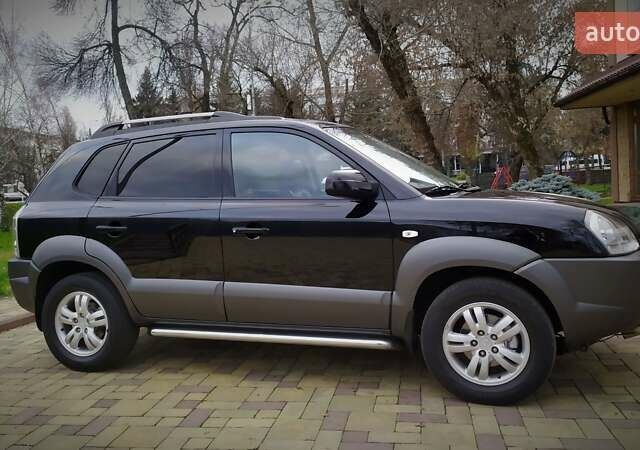 Чорний Хендай Туксон, об'ємом двигуна 2 л та пробігом 229 тис. км за 8600 $, фото 23 на Automoto.ua