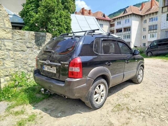 Черный Хендай Туксон, объемом двигателя 2 л и пробегом 223 тыс. км за 7500 $, фото 9 на Automoto.ua
